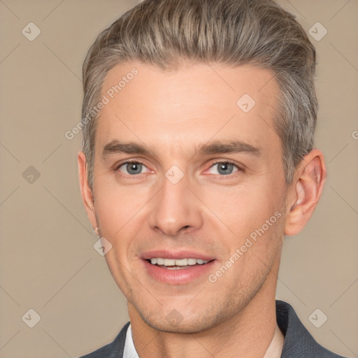 Joyful white adult male with short  brown hair and brown eyes