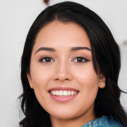 Joyful white young-adult female with long  black hair and brown eyes