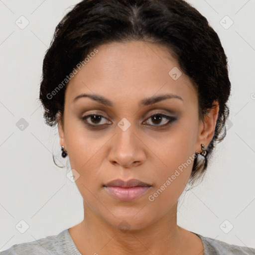 Joyful latino young-adult female with short  brown hair and brown eyes