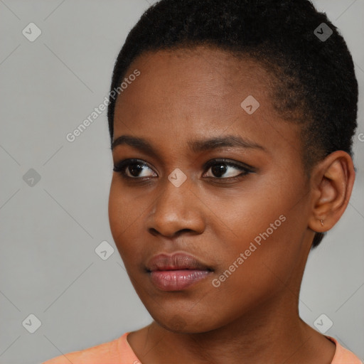 Neutral black young-adult female with short  brown hair and brown eyes