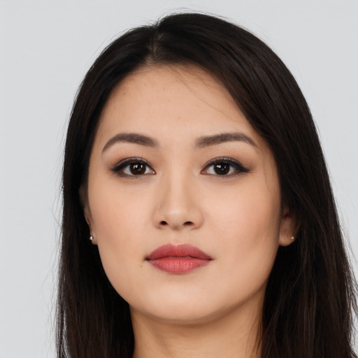 Neutral latino young-adult female with long  black hair and brown eyes