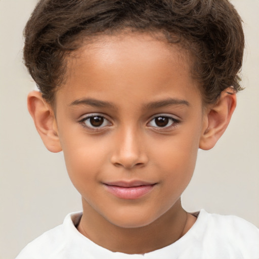 Joyful white child female with short  brown hair and brown eyes