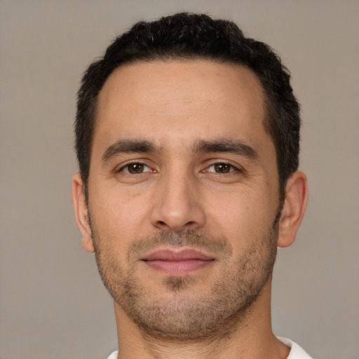 Neutral white young-adult male with short  brown hair and brown eyes
