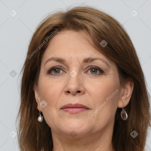 Joyful white adult female with long  brown hair and grey eyes