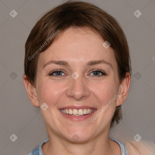 Joyful white adult female with medium  brown hair and grey eyes