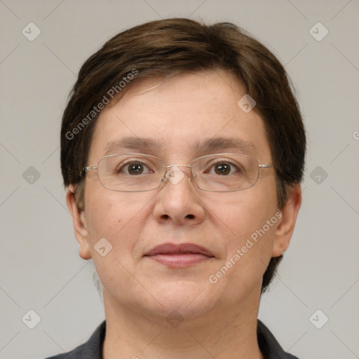 Joyful white adult female with short  brown hair and grey eyes