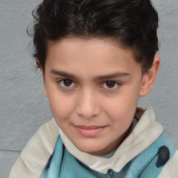 Joyful white child male with short  brown hair and brown eyes