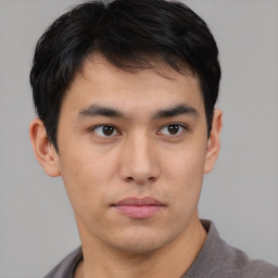 Neutral asian young-adult male with short  brown hair and brown eyes