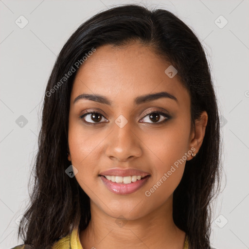 Joyful latino young-adult female with long  brown hair and brown eyes