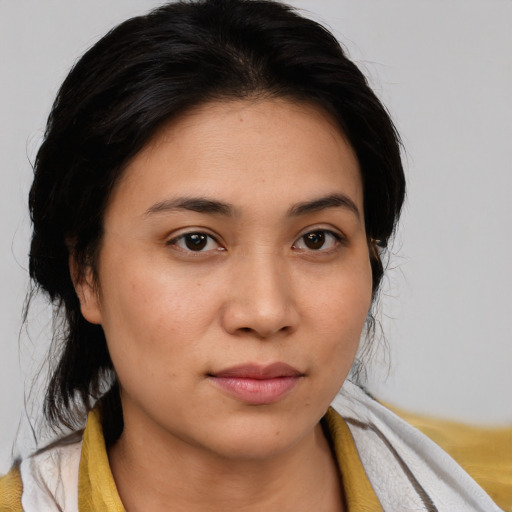 Joyful white young-adult female with medium  brown hair and brown eyes