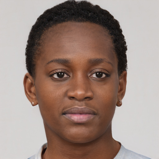 Neutral black young-adult female with short  brown hair and brown eyes