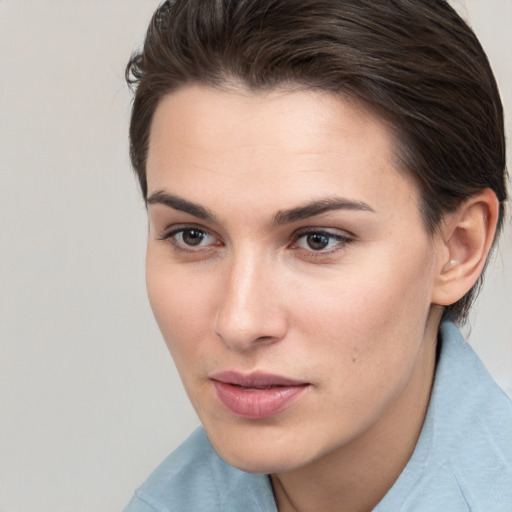 Neutral white young-adult female with medium  brown hair and brown eyes