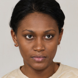 Neutral black young-adult female with short  black hair and brown eyes