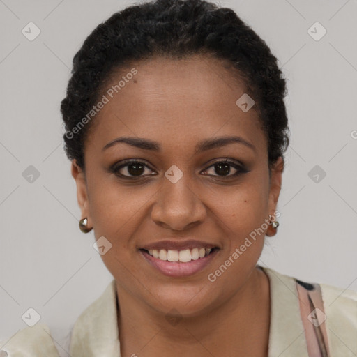 Joyful black young-adult female with short  brown hair and brown eyes