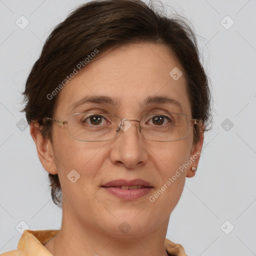 Joyful white adult female with short  brown hair and brown eyes