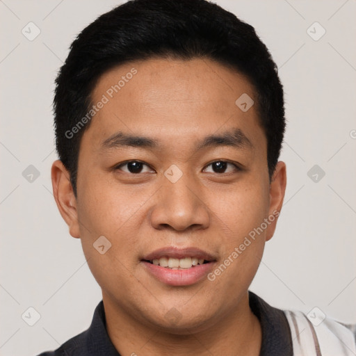 Joyful white young-adult male with short  black hair and brown eyes