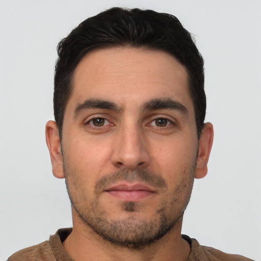 Neutral white young-adult male with short  black hair and brown eyes