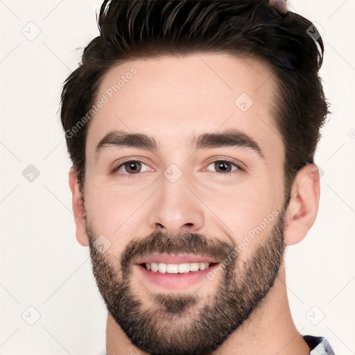 Joyful white young-adult male with short  black hair and brown eyes