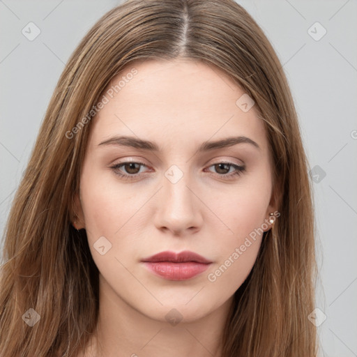 Neutral white young-adult female with long  brown hair and brown eyes