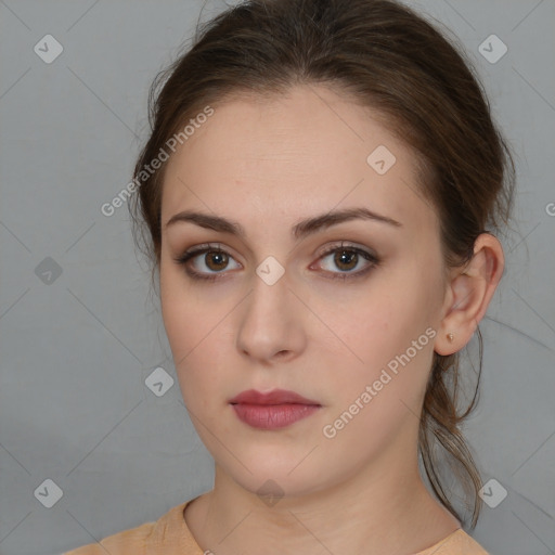 Neutral white young-adult female with medium  brown hair and brown eyes