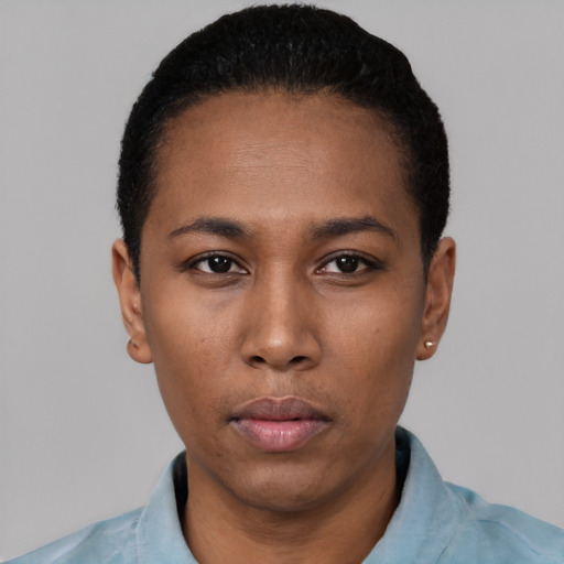 Neutral black young-adult female with short  black hair and brown eyes
