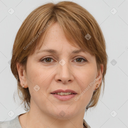 Joyful white adult female with medium  brown hair and grey eyes