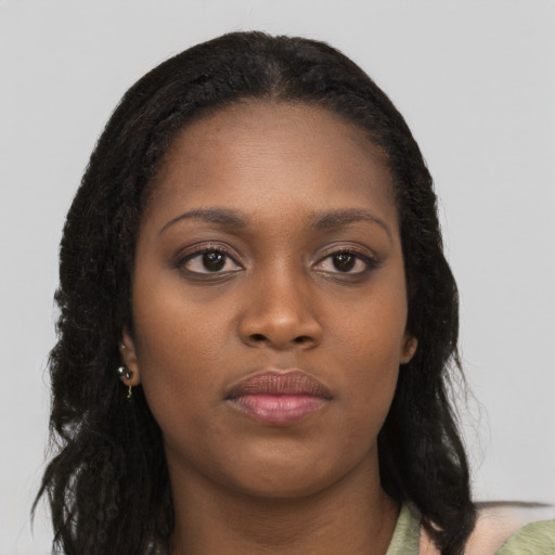 Neutral black young-adult female with long  black hair and brown eyes