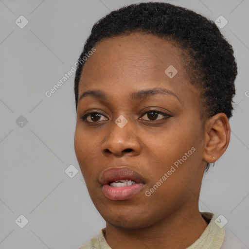 Neutral black young-adult female with short  black hair and brown eyes