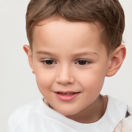 Joyful white child male with short  brown hair and brown eyes