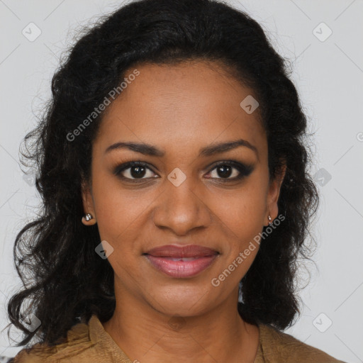 Joyful black young-adult female with long  brown hair and brown eyes