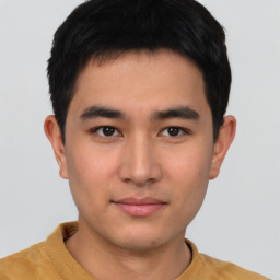 Neutral asian young-adult male with short  brown hair and brown eyes