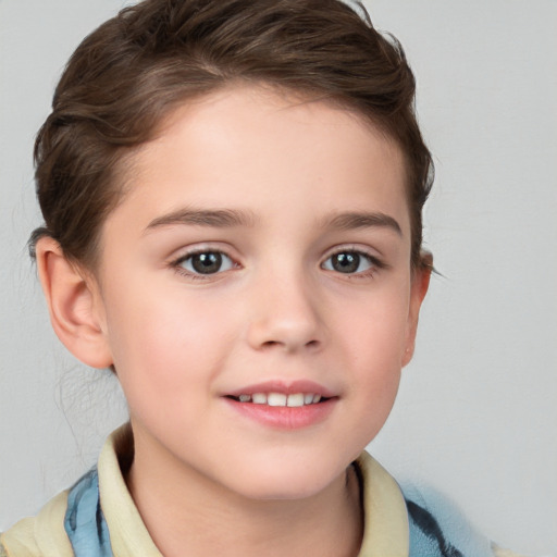 Joyful white child female with short  brown hair and brown eyes