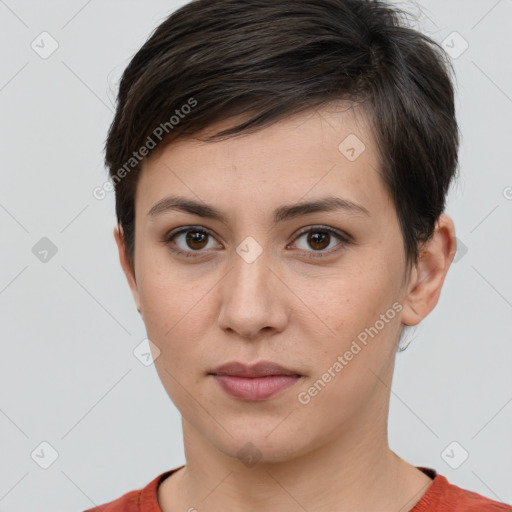 Joyful white young-adult female with short  brown hair and brown eyes