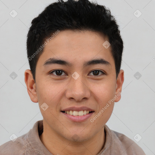 Joyful latino young-adult male with short  brown hair and brown eyes