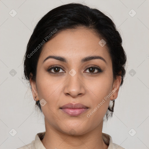 Joyful latino young-adult female with medium  brown hair and brown eyes