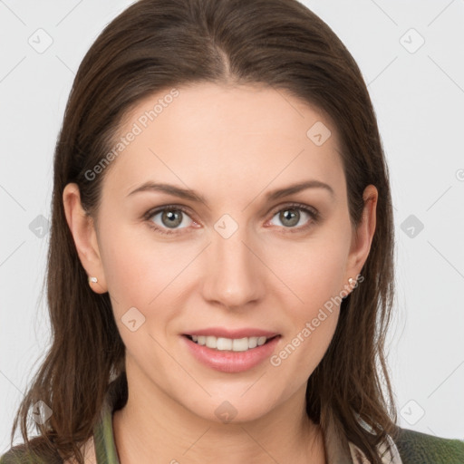 Joyful white young-adult female with long  brown hair and grey eyes