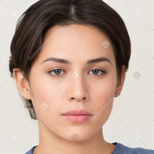 Neutral white young-adult female with short  brown hair and brown eyes