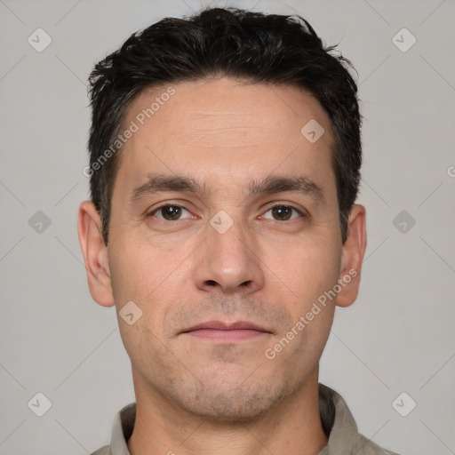 Neutral white adult male with short  black hair and brown eyes