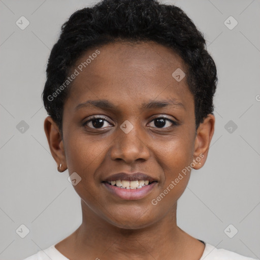 Joyful black young-adult female with short  black hair and brown eyes