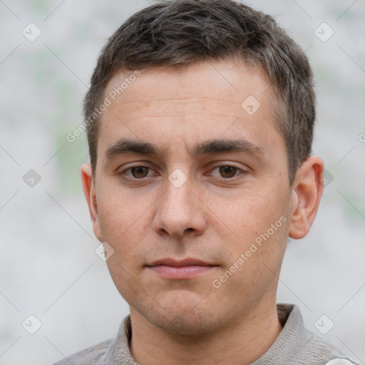 Neutral white young-adult male with short  brown hair and brown eyes