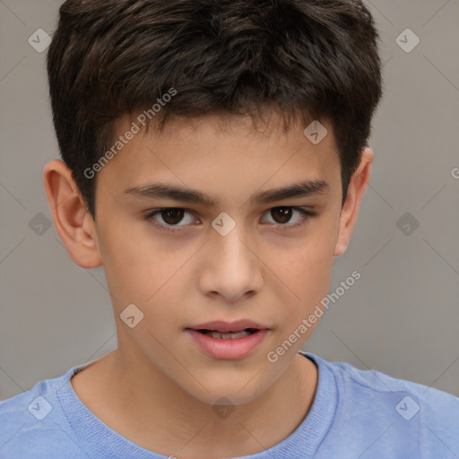 Joyful white child male with short  brown hair and brown eyes