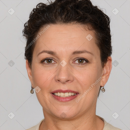 Joyful white adult female with short  brown hair and brown eyes