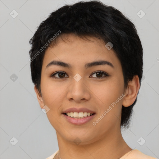 Joyful asian young-adult female with short  black hair and brown eyes