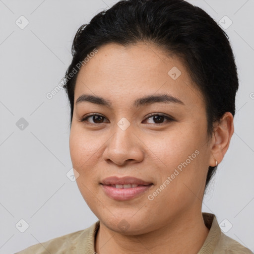 Joyful asian young-adult female with short  brown hair and brown eyes