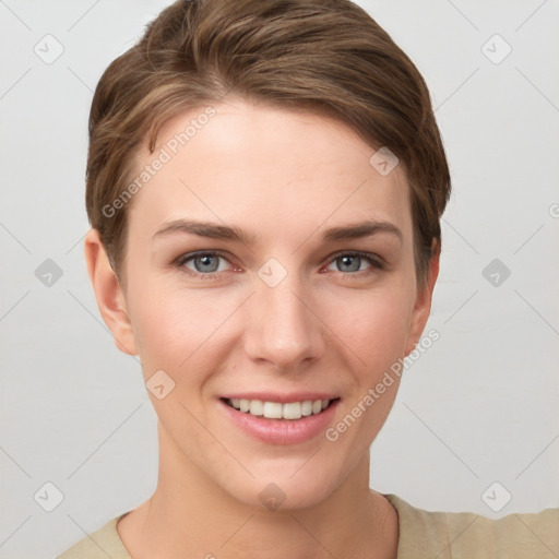 Joyful white young-adult female with short  brown hair and grey eyes