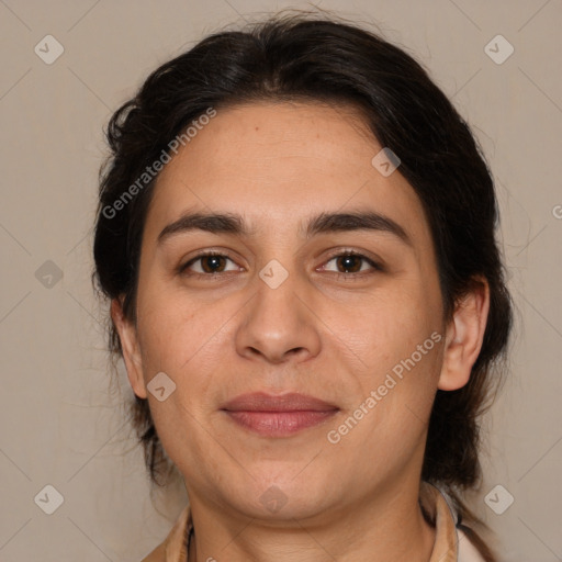 Joyful white adult female with medium  brown hair and brown eyes