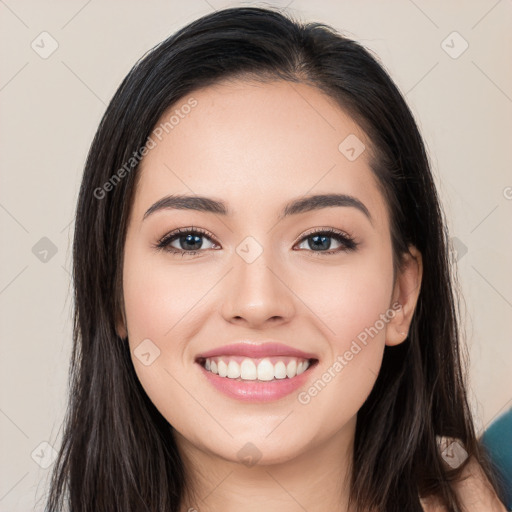 Joyful white young-adult female with long  black hair and brown eyes