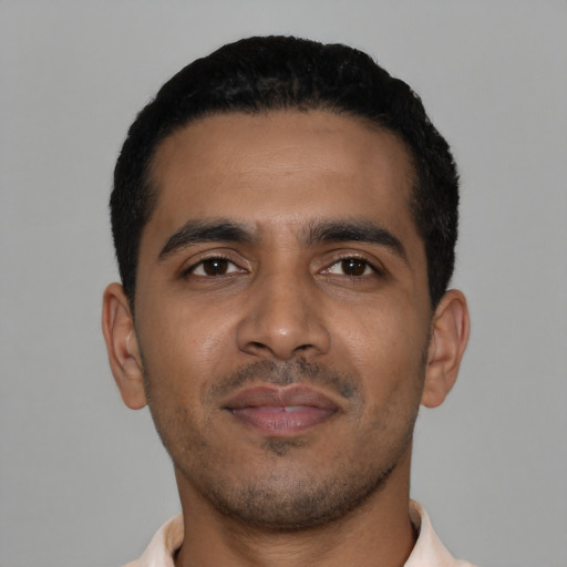 Neutral latino young-adult male with short  black hair and brown eyes
