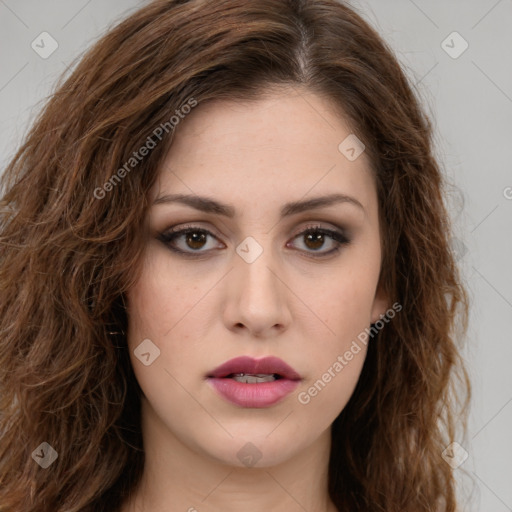 Neutral white young-adult female with long  brown hair and brown eyes