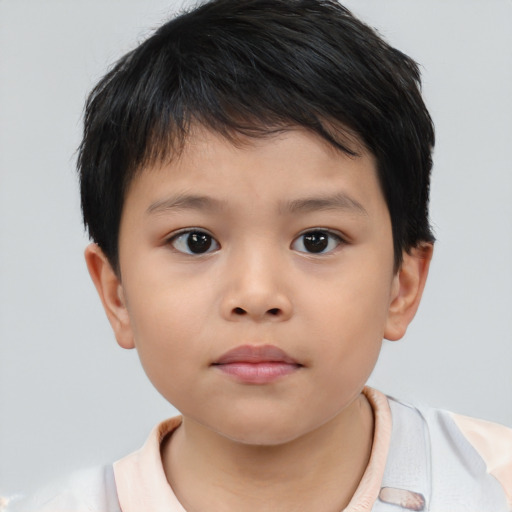 Neutral asian child male with short  brown hair and brown eyes